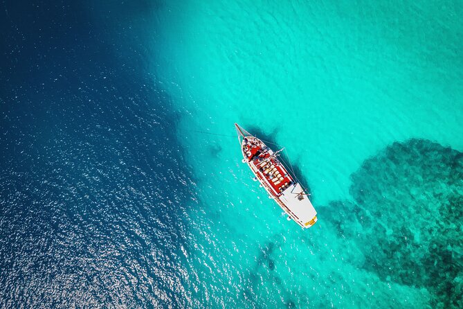 All-Inclusive Blue Lagoon & 3 Island Boat Tour with Food & Drinks - St. Fumija bay: quieter water, fruit service, and ladder access