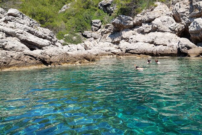 Blue cave tour - 4 caves and sandy beach - Boat ride realities: speedboat comfort, sea spray, and staying warm