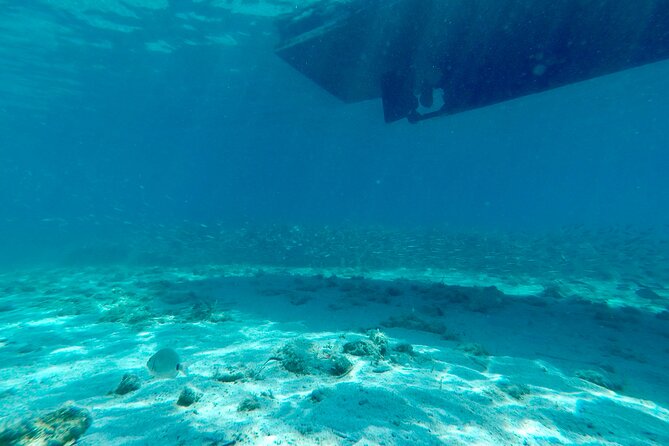 Blue Lagoon & 3 Islands Private Boat Tour - Blue Lagoon and Krknjasi Bay: swimming, snorkeling, and pacing your crew