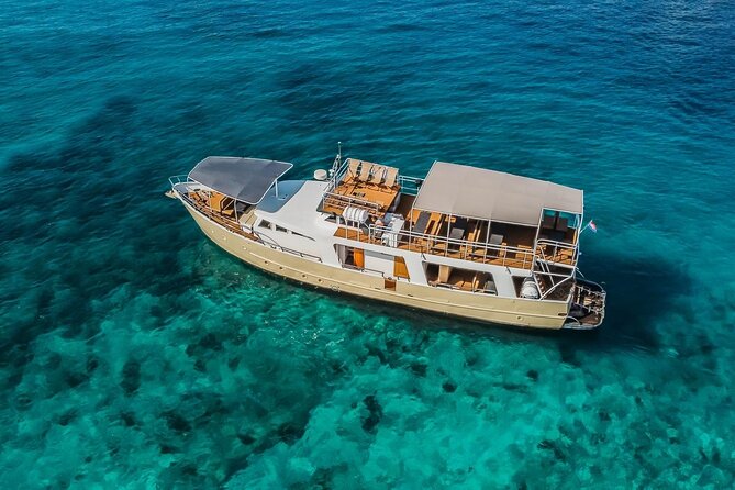 Blue Lagoon and 3 Island Boat Tour with Food and Drinks Included - Drvenik’s Blue Lagoon: the clarity moment