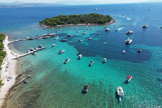 Blue Lagoon Tour from Split with Bottled Water and Wine Included - Stop 3 on Čiovo Island: beach breaks under the pines