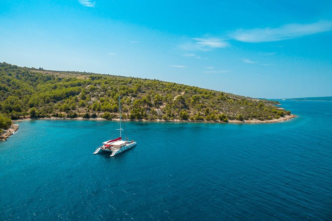 Blue Lagoon, Trogir & Čiovo catamaran tour with Food and Drinks - Stop 3: Fumia Bay on Čiovo, lunch onboard, and the second swim