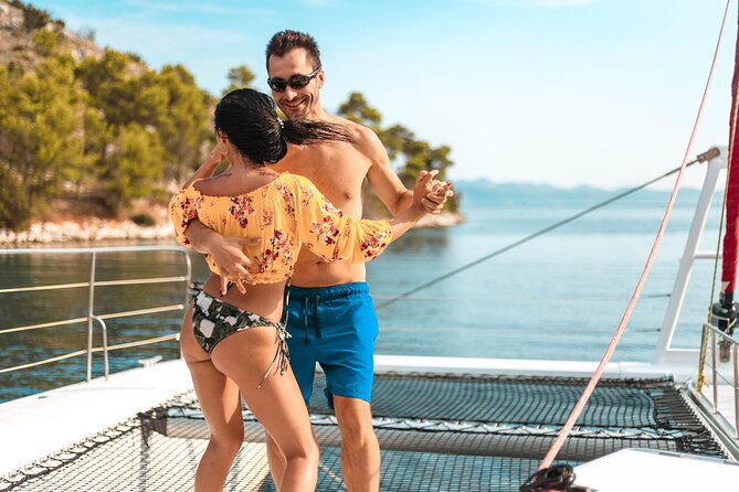 Blue Lagoon, Trogir & Čiovo catamaran tour with Food and Drinks - Onboard vibe: drinks, dancing, toilets, and the seating reality check