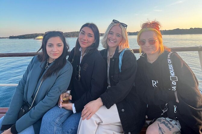 Dolphin Watching & Sunset Boat Tour With Dinner and Drinks - The sunset finale and the illuminated Pula return