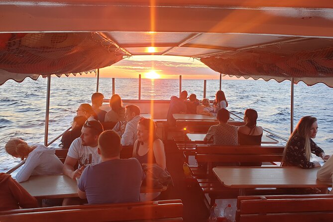 Dolphin Watching Sunset Boat Trip in Pula with Dinner - Key things to know before you go