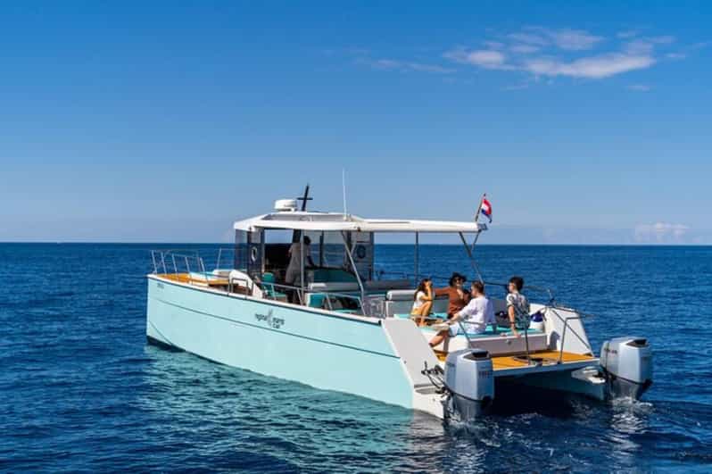 Dubrovnik: Blue Cave Catamaran Tour with Drinks and Snorkel - Blue Cave at Koločep Island: The Light Show Everyone Talks About