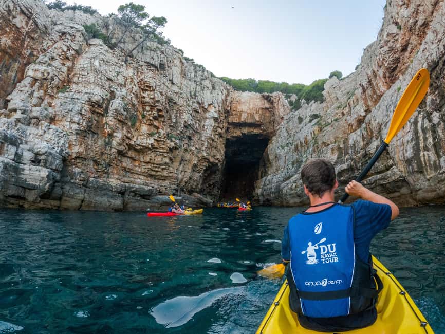 Dubrovnik: Guided Sunset Sea Kayaking with Snacks and Wine - Snorkelling time, swimwear planning, and staying warm when the sea cools