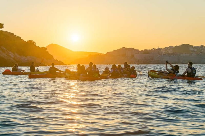 Dubrovnik: Guided Sunset Sea Kayaking with Snacks and Wine - Lokrum Island and the wine sunset moment near the horizon