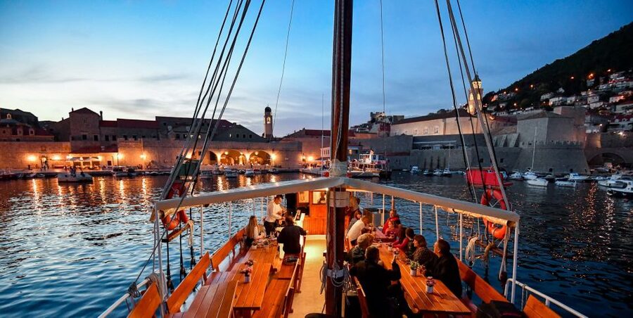 Dubrovnik: Old Town Cruise with Lunch - Lunch on Board: Welcome Snacks, Sea Bass, and Local Wine