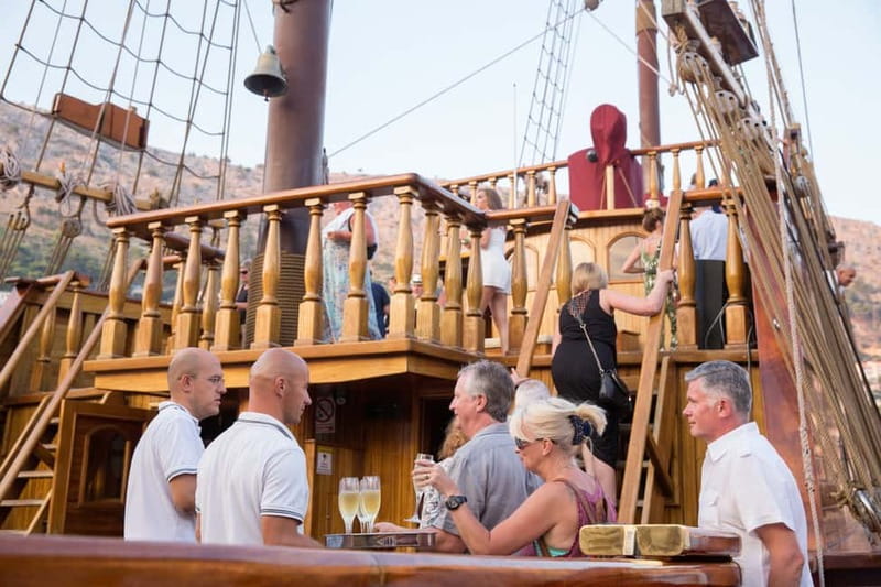 Dubrovnik: Panoramic Sunset Cruise on Karaka Ship - Stepping onto the Karaka ship in Dubrovnik Harbor