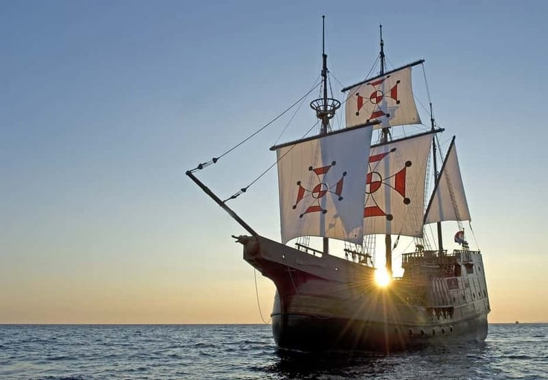 Dubrovnik: Panoramic Sunset Cruise on Karaka Ship - The route: Dubrovnik Old Town from the water at golden hour