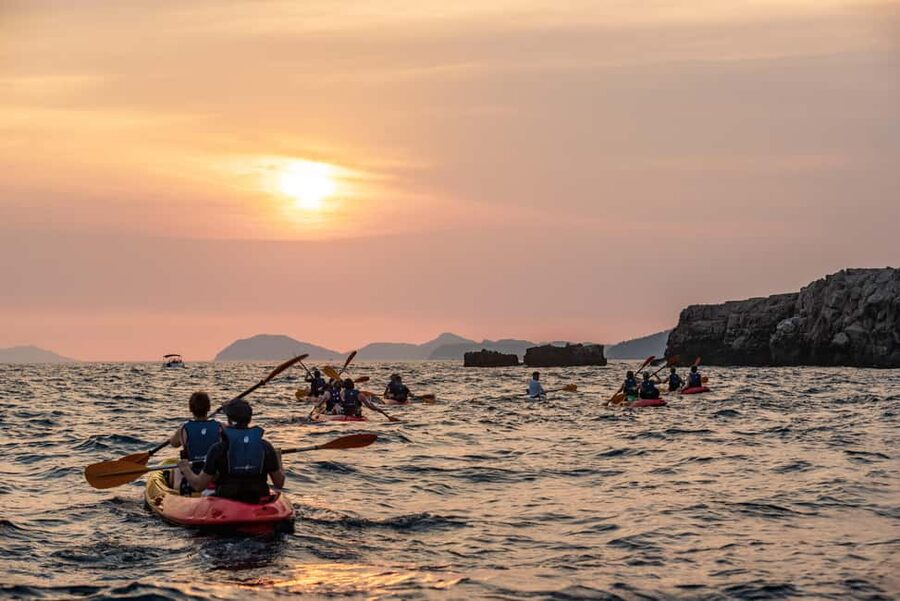 Dubrovnik: Sunset Kayaking and Snorkeling Tour - Paddling back along the city walls, then wine onshore