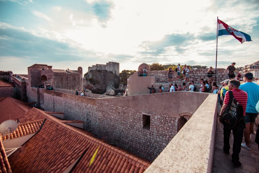 Dubrovnik: Walls and Wars Walking Tour - Meeting at Pile and finding your guide with orange umbrellas