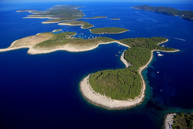 Exclusive Private Tour: Red Rocks & Pakleni Islands - Dubovica Beach: Clear Water, Pebble Shore, and a Small Underwater Surprise
