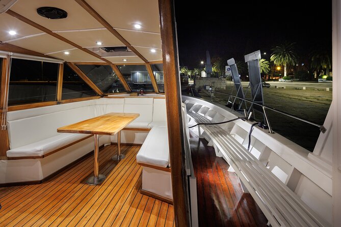 Fantastic DOLPHIN & SUNSET TOUR with dinner ( Pula-NP BRIJUNI ) - Returning to Pula: The Lighting Giants at Night