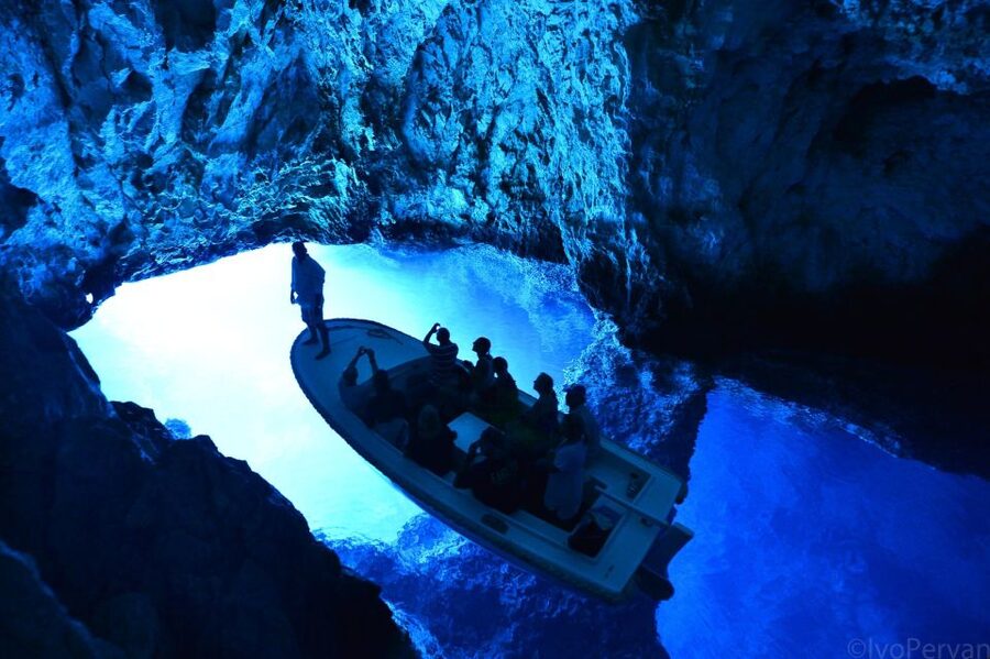 From Hvar: Blue and Green Cave Day Tour - Green Cave on Ravnik Island: emerald light and swim time