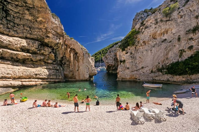 From Hvar: Blue Cave and Pakleni Islands Group Tour - Green Cave near Vis: sunlight, swim options, and short waits