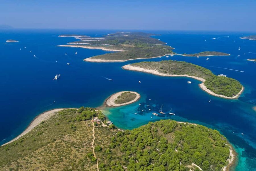 From Hvar: Blue Cave and Pakleni Islands Group Tour - Blue Cave: the light show, official access, and ticket timing