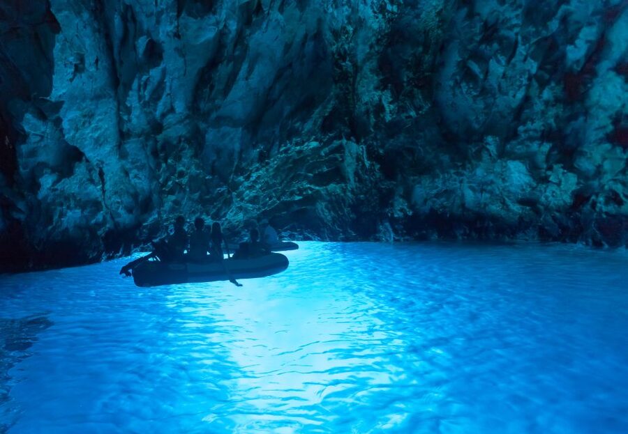 From Omis: Blue Cave & 5 Island Speedboat Tour - Blue Cave on Biševo: flickering blue light, Monk Seal Cave, and the sea-condition twist