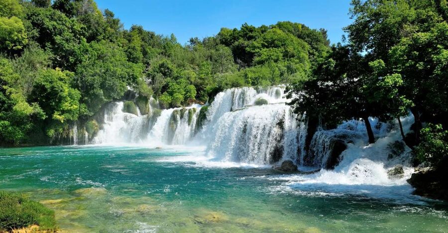 From Omiš: Krka Waterfalls and Trogir Small Group Tour - Krka National Park and Skradinski Buk, where the water looks carved