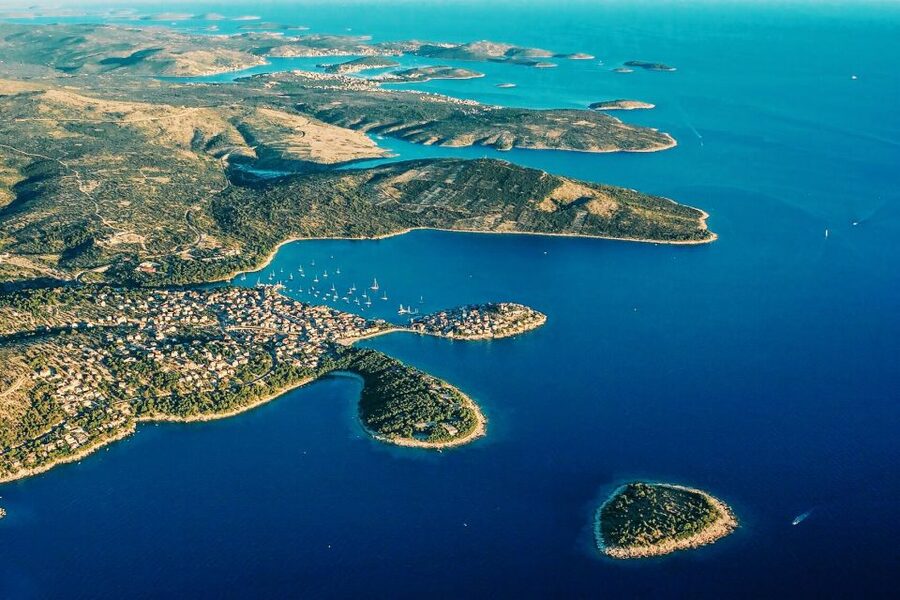 From Sinj: 1.5-Hour Private Flight over Kornati & Šibenik - Kaštela Bay to Rogoznica and Primošten: where the coastline turns into a system