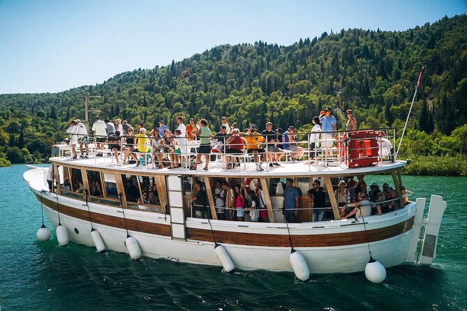 From Split: Krka Waterfalls Tour, Boat Cruise & Swimming - Krka National Park: the waterfalls, the easy walking, and the crowd reality