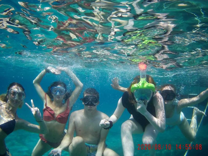 From Split: Luxury Cabin Boat Tour to The Blue Cave and Hvar - Blue Lagoon snorkeling near Budikovac, the moment most people remember