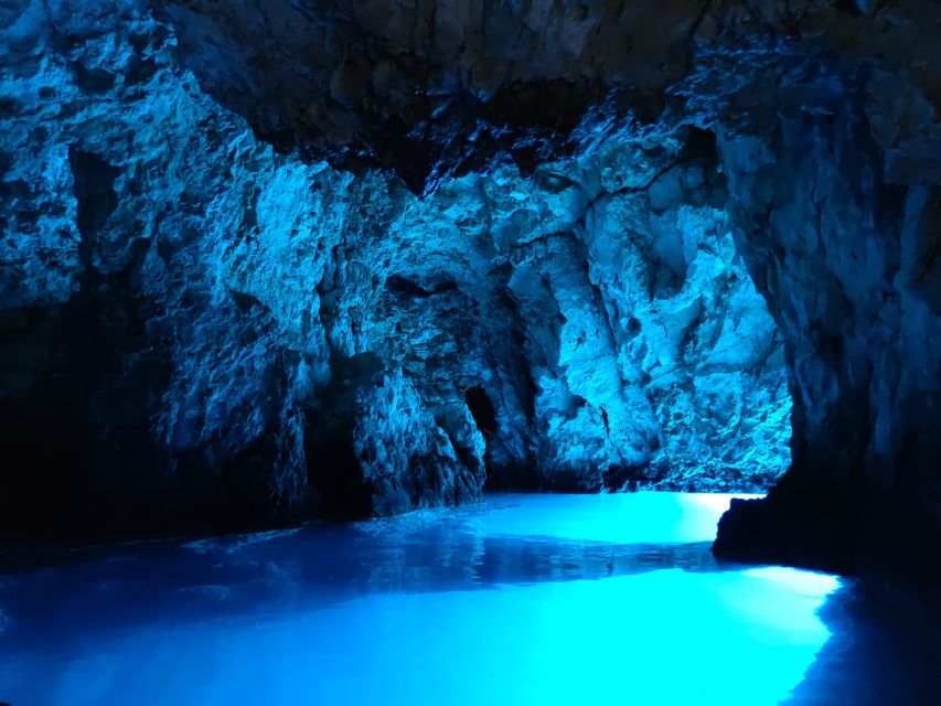 From Split: Luxury Cabin Boat Tour to The Blue Cave and Hvar - Entering the Blue Cave at Bisevo, tickets and the timing reality