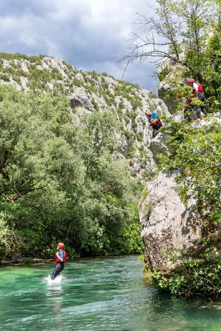 From Split: Rafting, Cave exploring, Cliff jumping w/ Picnic - Cetina River rafting with a canyoning-style menu