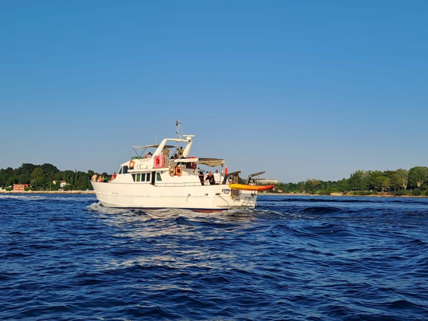 From Umag: Day Cruise to Poreč with Lunch and Swimming - Lunch on board with wine and schnapps: the onboard value