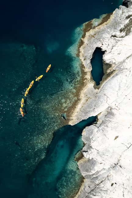 From Zadar: Dugi Otok Half-Day Kayak Adventure - The second bay run: kayaking, cliffs, and a cave that changes color