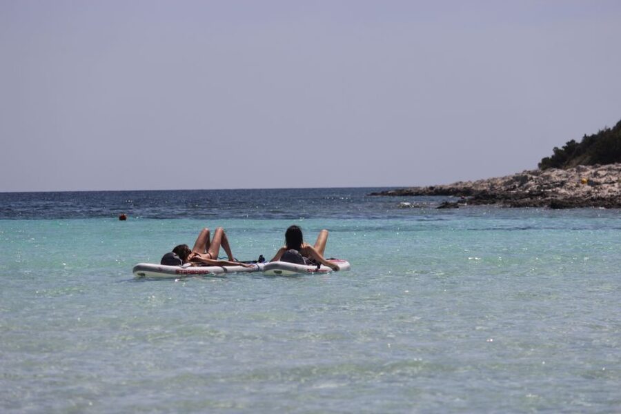 From Zadar: Full Day Dugi Otok Guided Paddle Board Tour - Entering the old submarine tunnels on a SUP