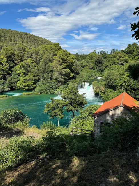 From Zadar: Krka Waterfalls Day Tour with Boat Ride & Guide - Reserved tickets and the cash detail that changes the total cost