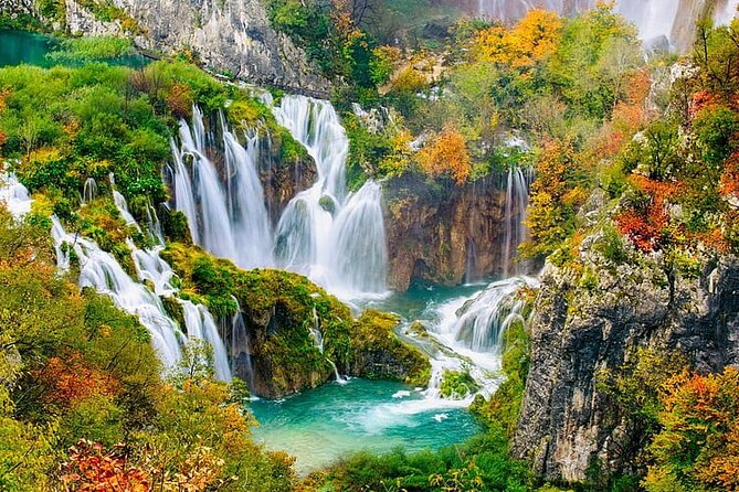 From Zadar: Plitvice Lakes Guided Day Tour with Tickets - The electric train and boat ride: the energy-saver moment