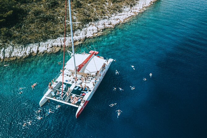 Full-Day Catamaran Cruise to Hvar & Pakleni Islands with Food and free Drinks - The Open Bar, Music, and the Deck Party Finale