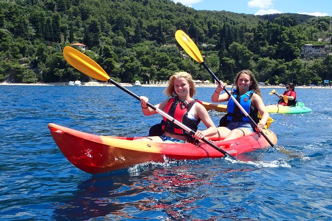 Half-Day Split Sea Kayak Adventure - Beach stop with swimming and cliff jumping choices