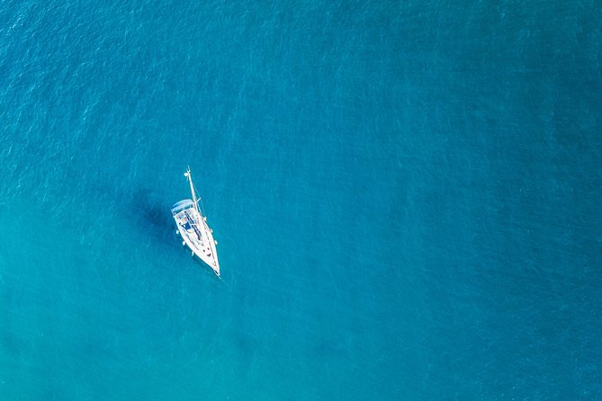 Hvar - Full Day Sail on a yacht - friendly skipper- small group - lunch optional - The Red Rocks stop: dramatic color, cliff-side options, and great photos
