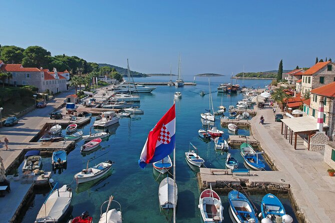 Islands Brač, Šolta & Blue lagoon - Private speedboat tour - Vela Rina beach near Trogir: sandy, warm, and calmer than you’d expect