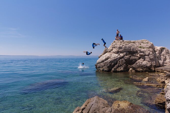 Kayaking in the Adriatic Sea with Snorkeling from Podstrana - The pebble-lined beach stop: where snorkeling and cliff time happen