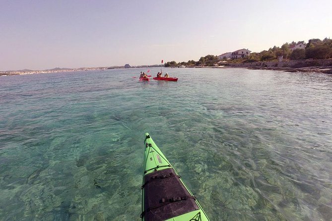 Kayaking to the island Prvić - Your guide experience: Ivan’s route storytelling and Guste’s team feel