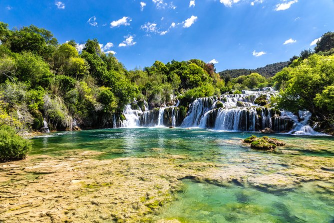 Krka Waterfalls & historic Šibenik - driver&guide, boat cruise, lunch break - Skradinski buk waterfall time: why the second focus feels worth it
