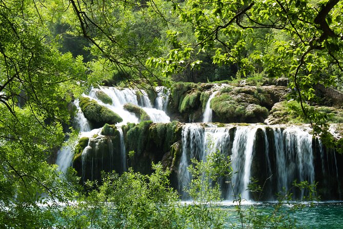 Krka Waterfalls Tour with Wine and Olive Oil Tasting - Stop 1: Krka National Park waterfalls, bridges, and smart walking time