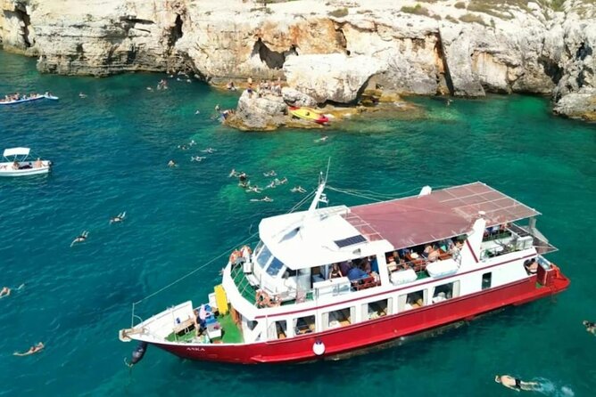 Medulin -Kamenjak 5h boat trip with lunch & drinks on Sandra Boat - Porer lighthouse cruising: learning on the move