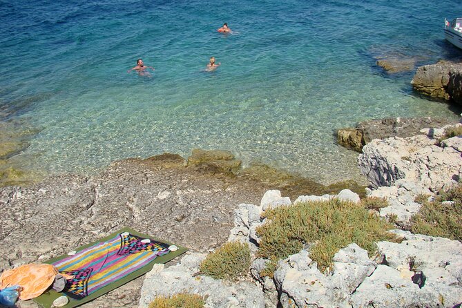 Medulin -Kamenjak 5h boat trip with lunch & drinks on Sandra Boat - Ceja Island: the beach break, bar, and the reality of sun and shade