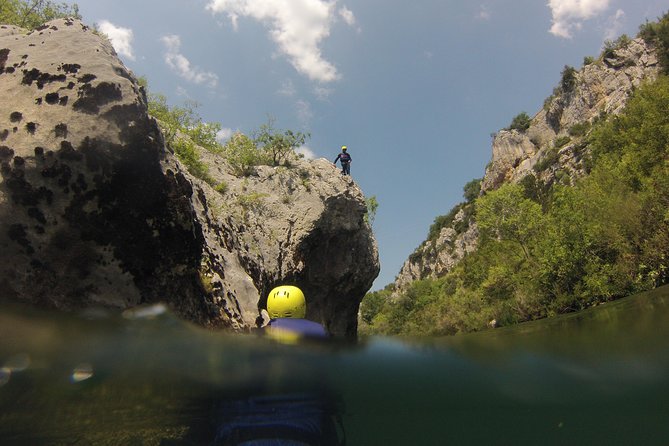 Multi Adventure Experience - Rafting with elements of canyoning - Canyoning-style fun: snorkeling, cliff jumping, and patience on the rocks