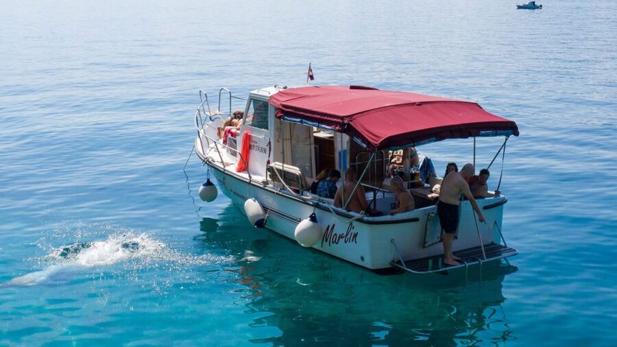 Opatija/Lovran: Boat Trip to Secluded Beaches on Island Cres - Drinks on board: a fun perk, plus one reality check