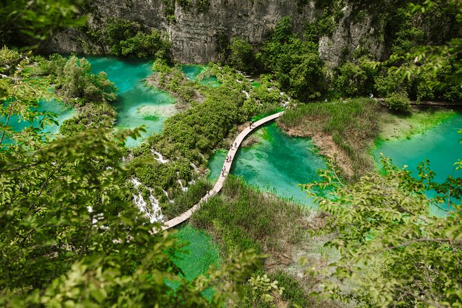 Plitvice Lakes and Rastoke Small-Group with Ticket (ENG or ESP) - Lake Kozjak lunch and the electric boat on calm water