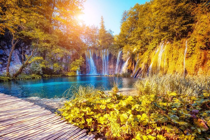 Plitvice Lakes Guided tour with Entrance ticket included - Inside Plitvice: Cruise, Boat Views, and an Electric Train