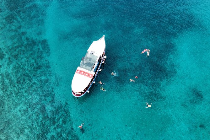 Podstrana and Jesenice, Boat trip to Brač and Šolta with lunch - First swim stop near Brac: anchored calm and ladder access