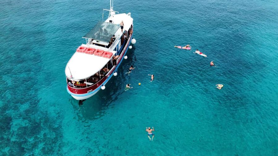 Podstrana: Full-Day Boat Trip to Brač and Shipwreck Kontesa - Welcome on Board: Schnapps, Donut, and a Relaxed Cruise Start
